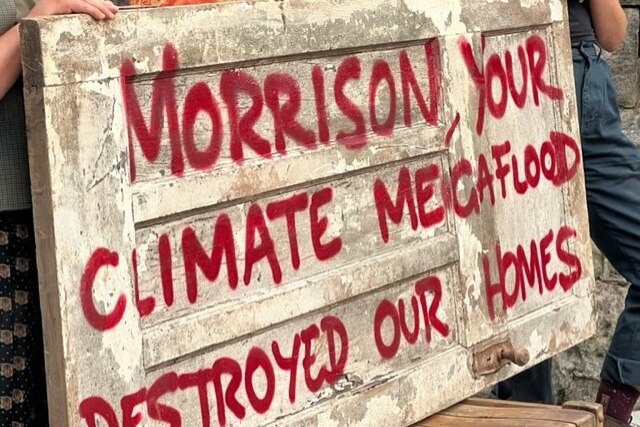 A sign protesting climate change blaming Prime Minisiter Scott Morrison