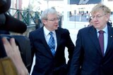 Kevin Rudd and Martin Ferguson arrive for a meeting