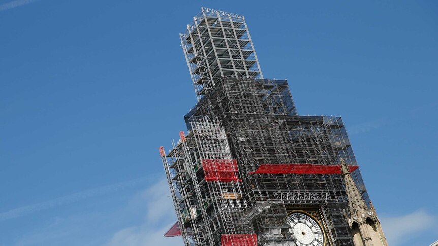 Scaffolding surrounds the Queen Elizabeth Tower which holds the bell known as Big Ben.