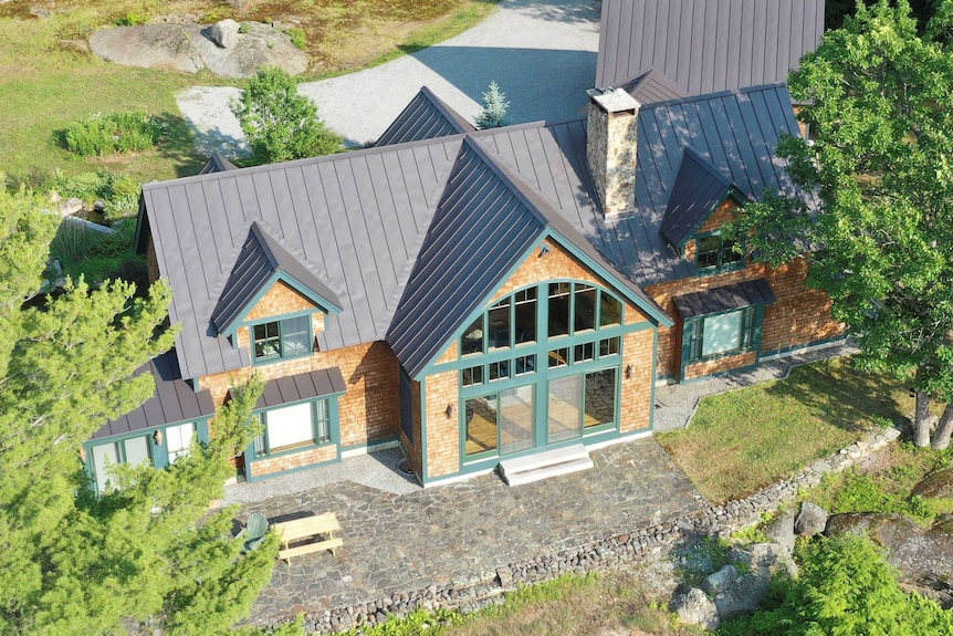 An aerial image of a timber home.