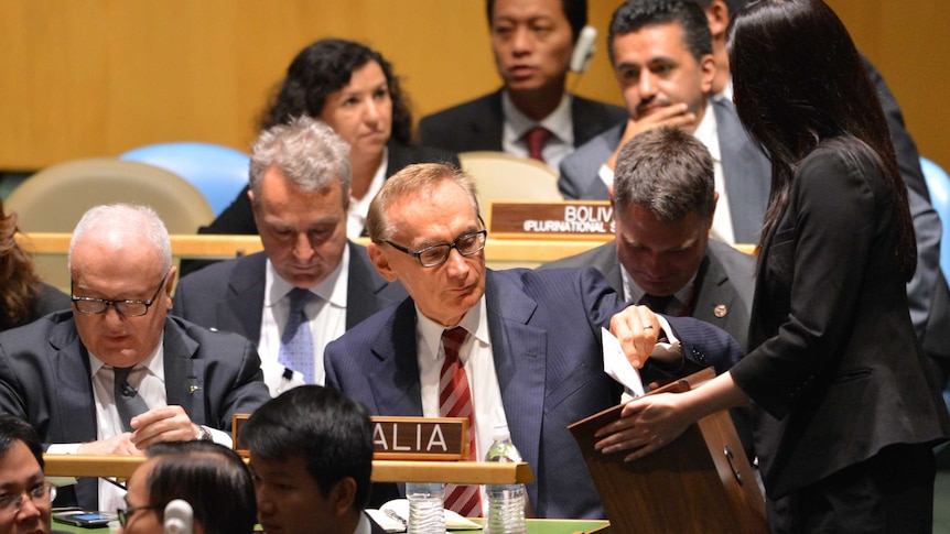 Bob Carr casts his vote during the ballot at the United Nations General Assembly in New York.