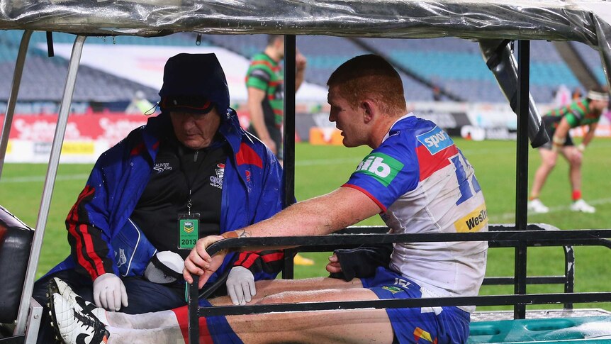 Ankle injury ... Alex McKinnon is taken from the field on a medicab