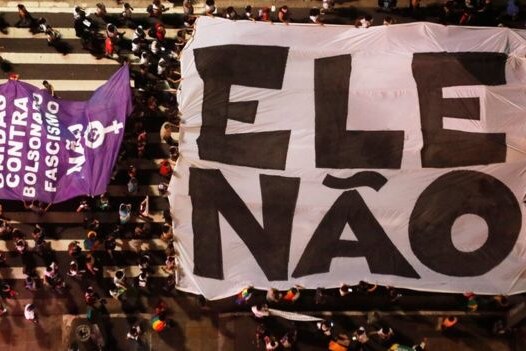 Huge #EleNao banner from above in the women's march against Jair Bolsonaro in Brazil