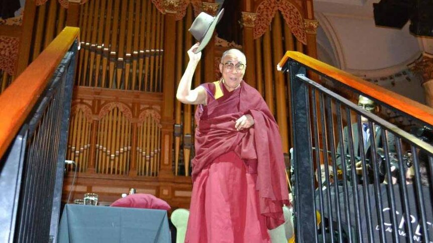 The visiting Dalai Lama was given an Akubra hat during his visit to Adelaide Town Hall.