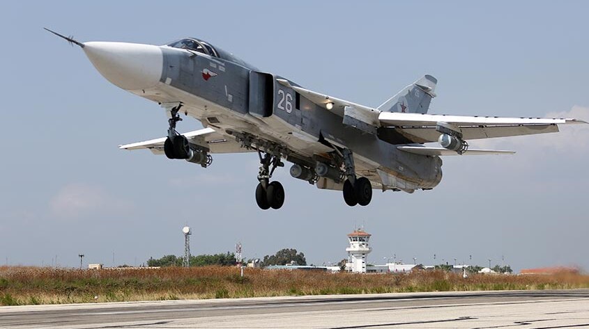 Russian jets at the Hmeymim airfield in Syria prepare to target Islamic State