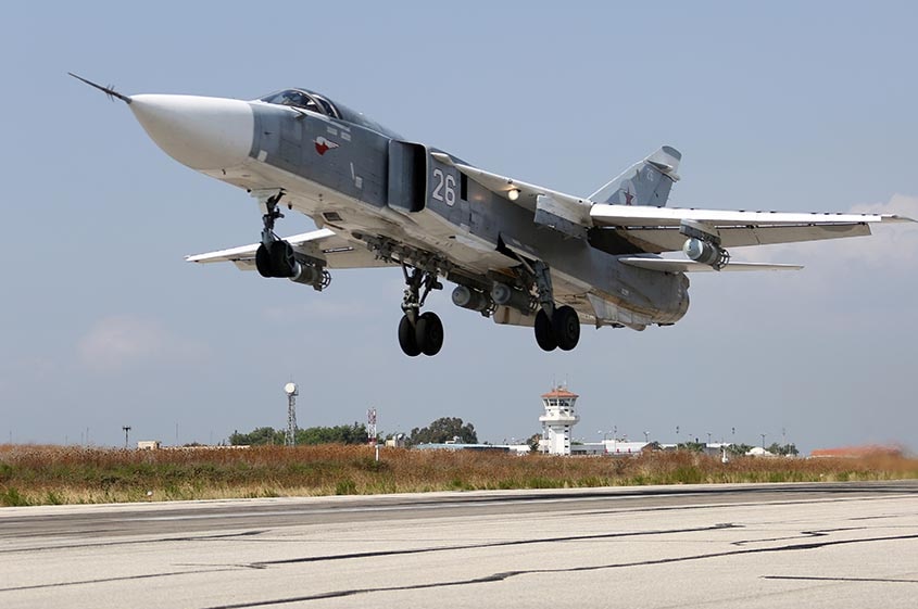 Russian jets at the Hmeymim airfield in Syria prepare to target Islamic State