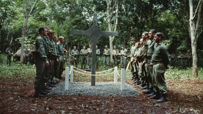 Australian soldiers erect a cross to commemorate the battle of Long Tan on August 18, 1969.
