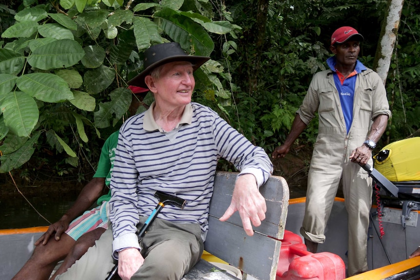 Happy to be back ... Sean Dorney smiles as he sits on a boat near Tulu, Papua New Guinea.