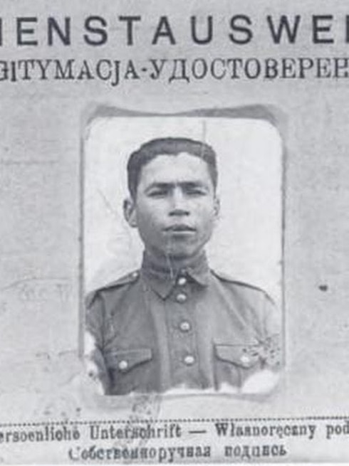 A black and white photo of an ID document from World War II.