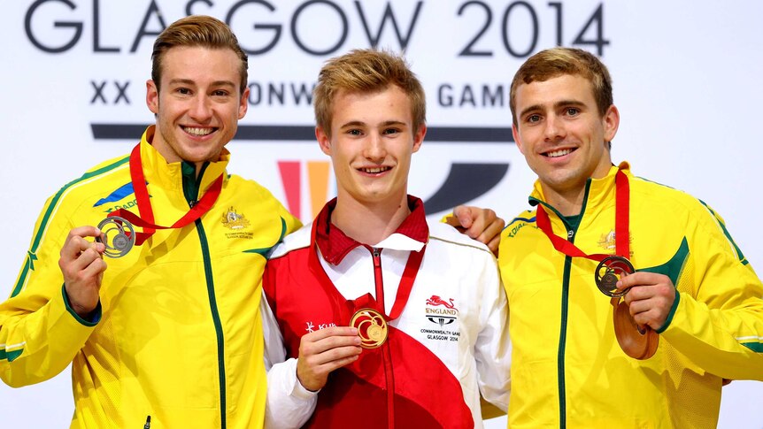 Matthew Mitcham and Grant Nel with their medals