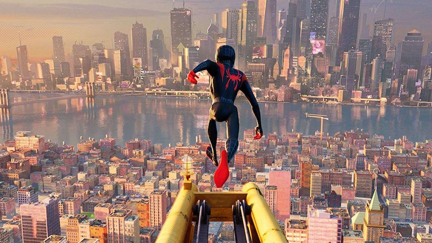 Spiderman jumps of a building in a scene from Into the Spider-Verse.