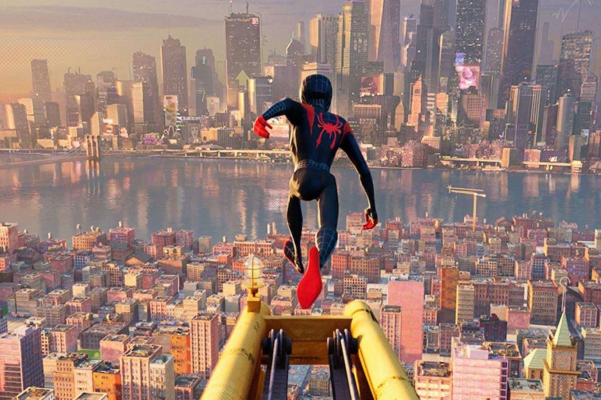 Spiderman jumps of a building in a scene from Into the Spider-Verse.