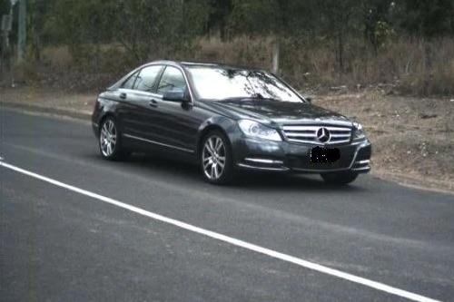 A black Mercedes
