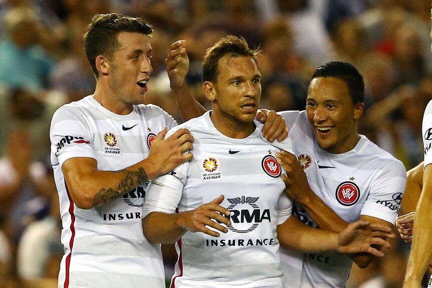 Brendon Santalab of the Wanderers celebrates after scoring against Melbourne Victory.