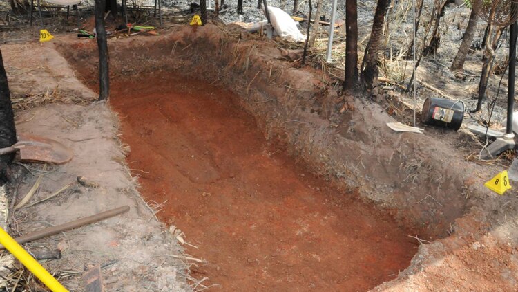 The grave where police say they found the body of Carlie Sinclair.