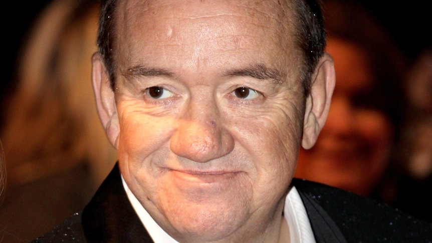 Actor and comedian Mel Smith attends a premiere in London.