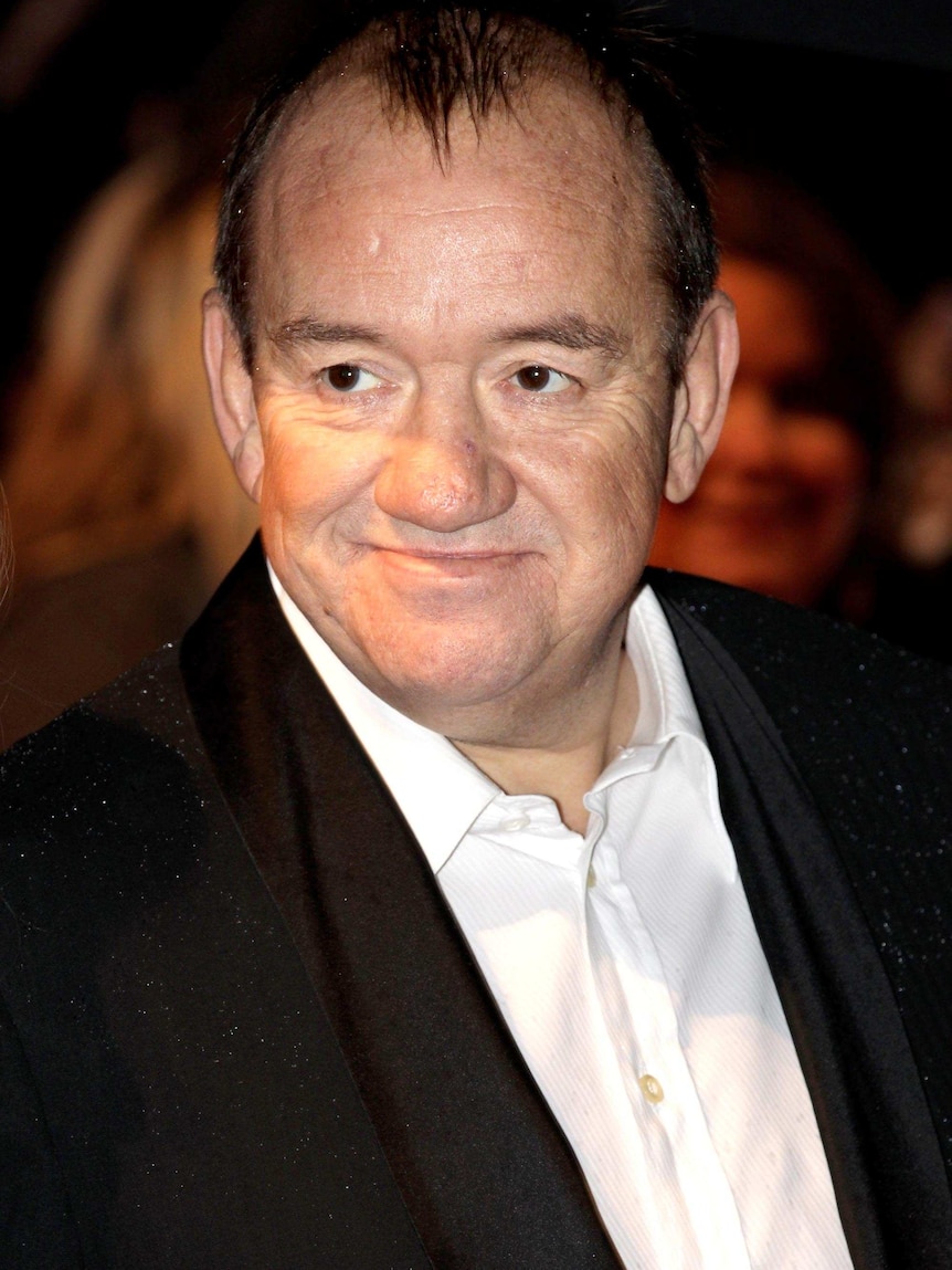 Actor and comedian Mel Smith attends a premiere in London.