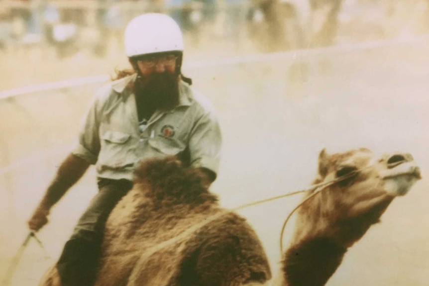 Neil Waters racing a camel at a previous race