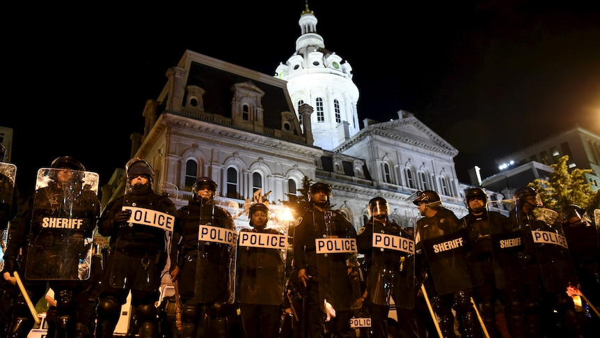 Baltimore riot police outside City Hall