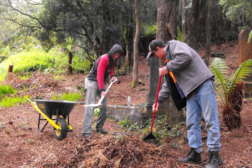 Workers restoring the Queenstown Prioneer Cemetery