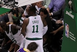 Game-changer: Derek Fisher (r) had 11 fourth-quarter points to boost the Lakers past the Celtics.