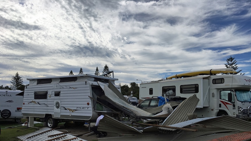 Tin and annexes ripped off caravans in a van park.