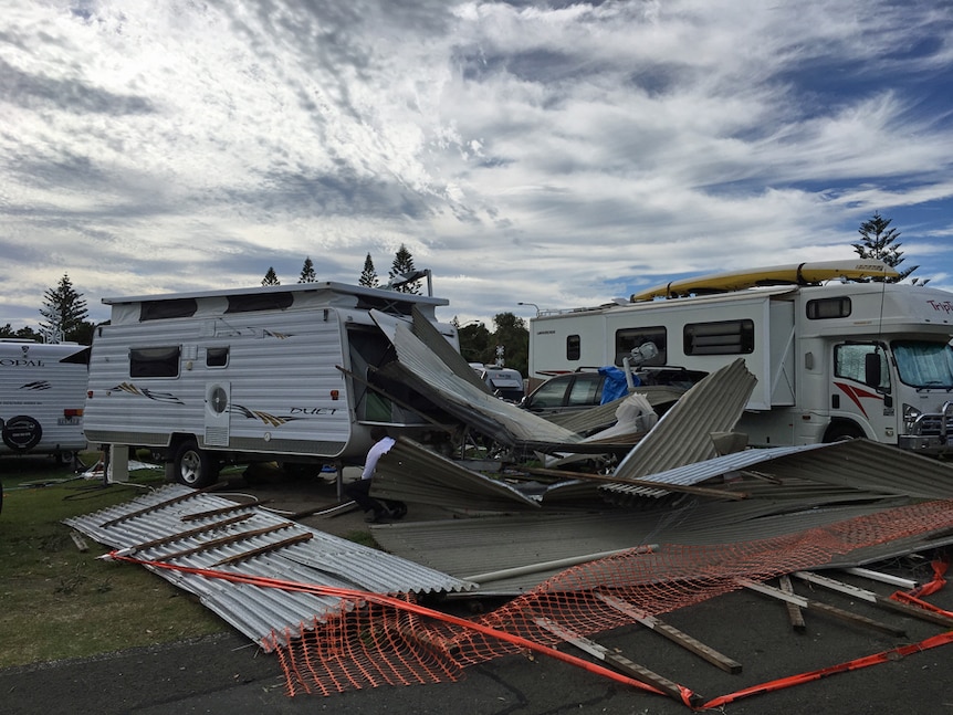 Tin and annexes ripped off caravans in a van park.