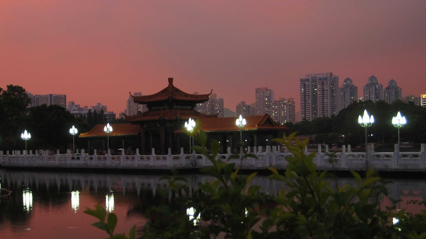 A photo of Shenzhen China at dusk.