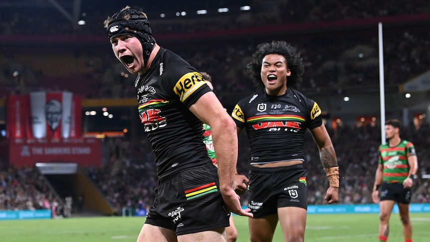 A Penrith Panthers NRL player celebrates scoring a try in the grand final.