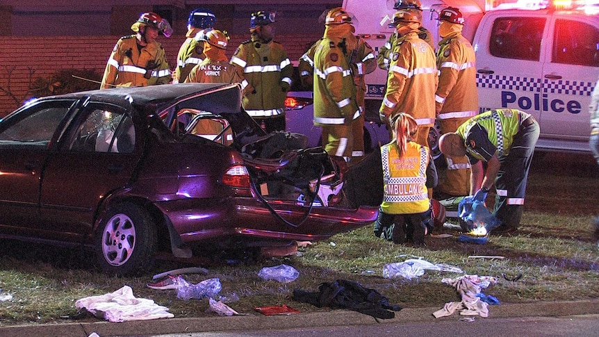 Emergency service workers at the scene of the crash.