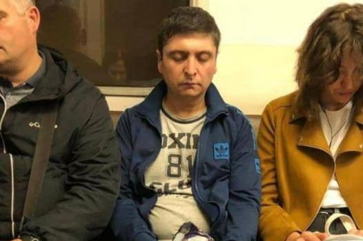 Volodymyr Zelenskyy lookalike Umid Isabaev pictured on a subway train in Ukraine