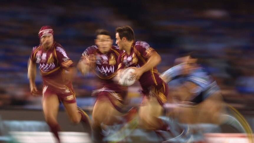 Cooper Cronk runs with the ball