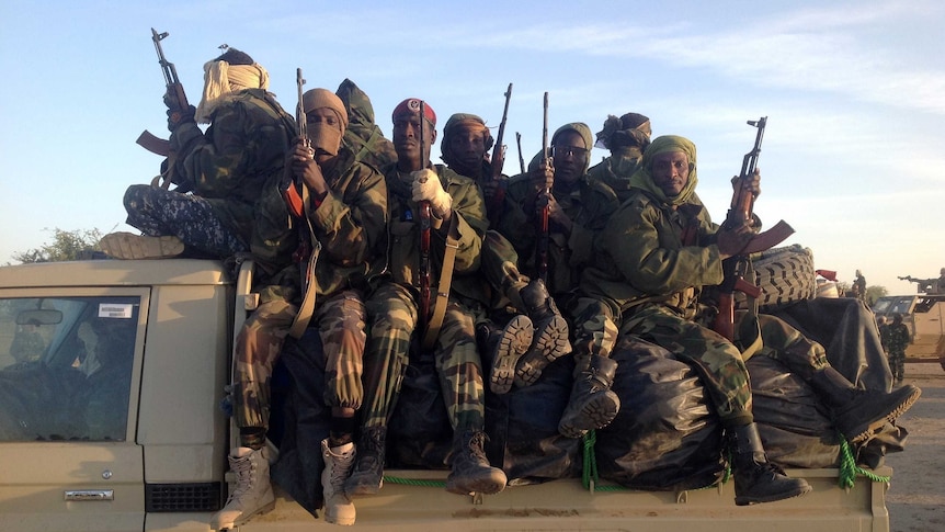 Soldiers of the Chadian army patrol the border between Nigeria and Cameroon