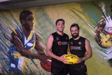 Tom Pike and Max Deighton wearing their AFL uniform
