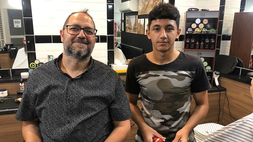 Syrian barber and 14-year-old son talk school holiday jobs and Aussie hair  cuts - ABC Newcastle