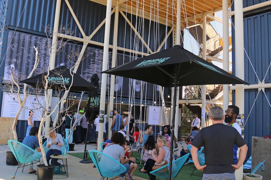 Shops and cafes inside the Westside pop up village