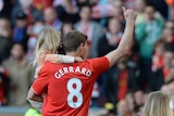 Steven Gerrard waves to the fans after his last Liverpool game