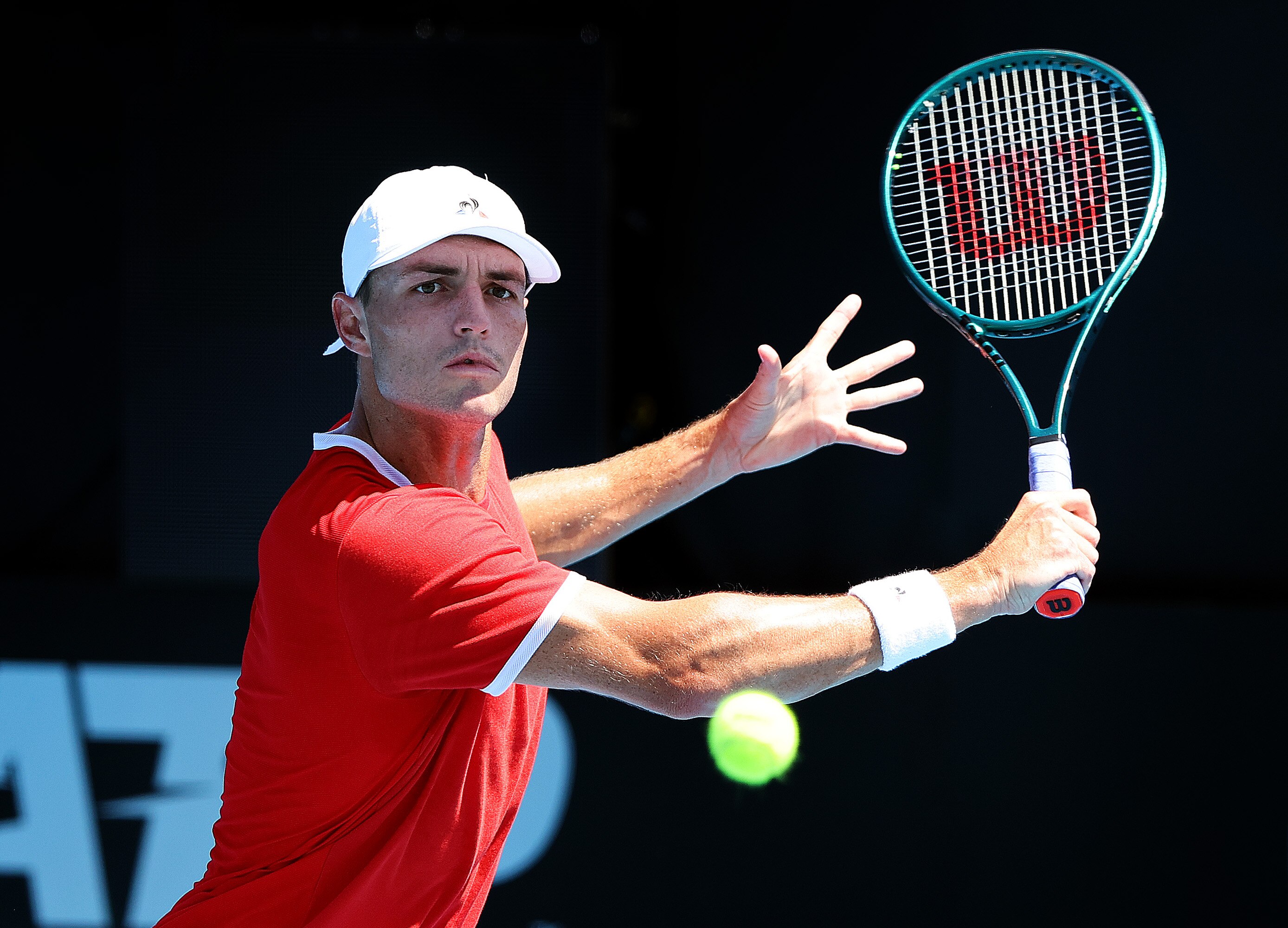 Christopher O'Connell watches intently as he prepares to play a backhand