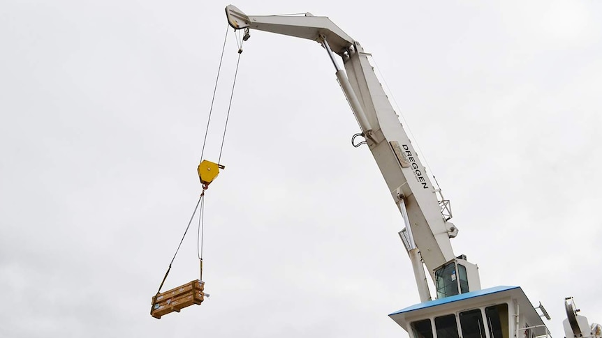 Crane lifts Argo deep sea float on to RV Investigator.