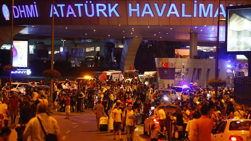People leave Turkey's largest airport following a blast