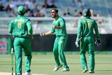 Pakistan's Imad Wasim (C) celebrates the wicket of Australian captain Steve Smith in the second ODI.
