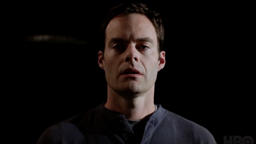 The actor Bill Hader in character as Barry stares into the camera in pain and confusion