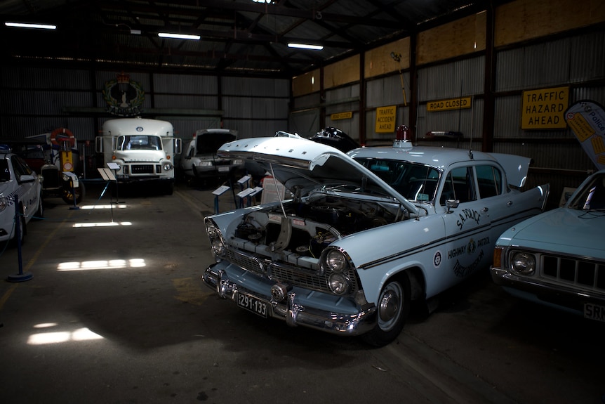 Vintage cars in a shed