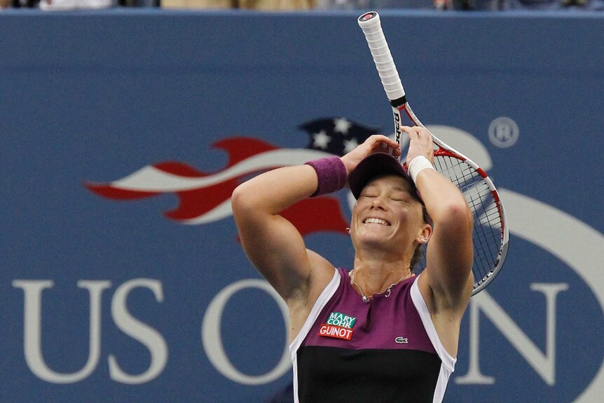 Samantha Stosur with her hands on her head as she celebrates winning the women's 2011 US Open final.