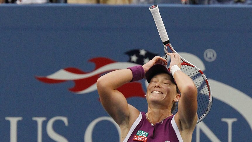 Samantha Stosur with her hands on her head as she celebrates winning the women's 2011 US Open final.