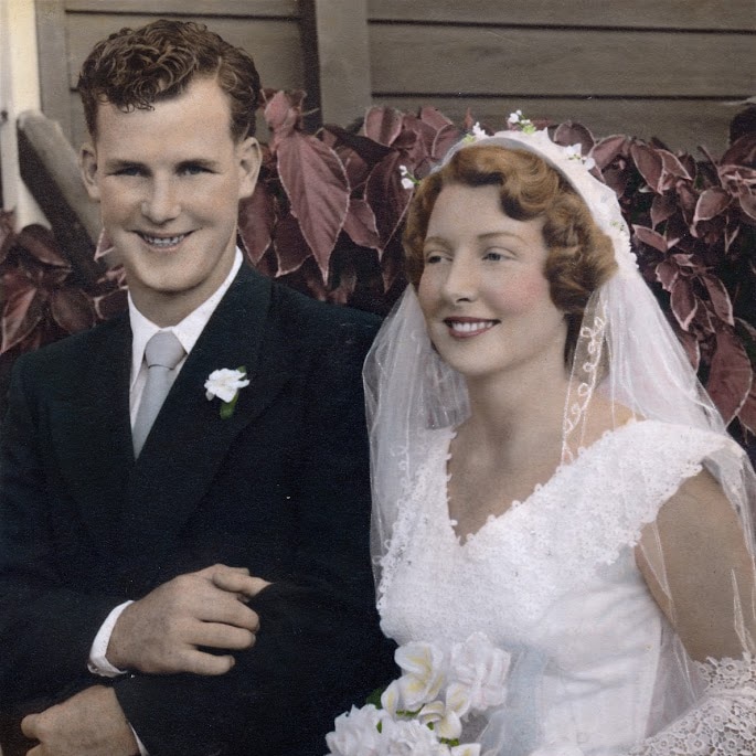 Coloured photo of couple being married
