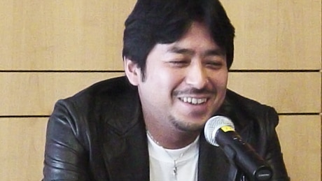  Kazuki Takahashi with a microphone