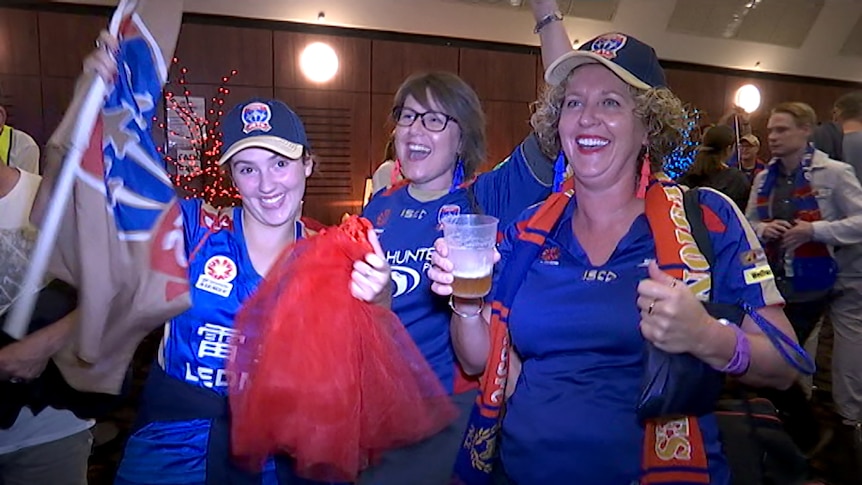 Newcastle Jets fans party despite losing their first home grand-final since 2008 to Melbourne Victory.