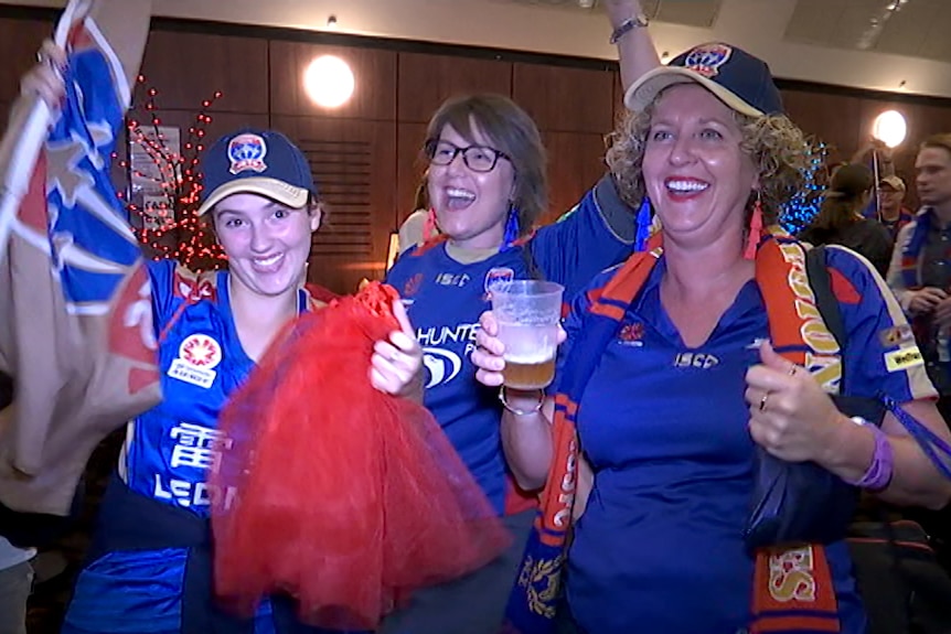 Newcastle Jets fans party despite losing their first home grand-final since 2008 to Melbourne Victory.