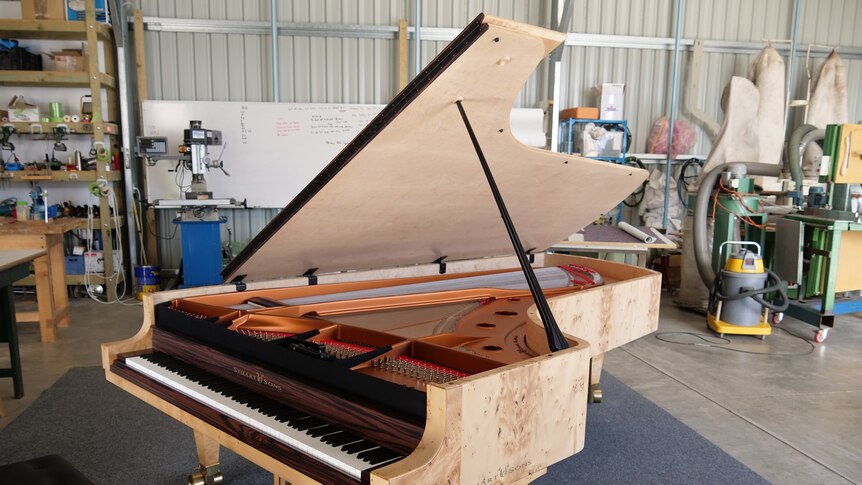 The piano was made using ancient Tasmanian Huon pine